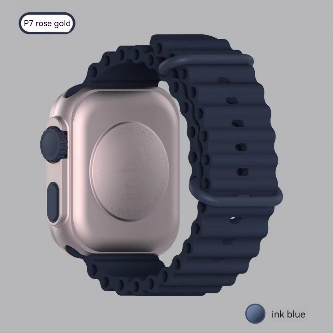 Smartwatch with a rose gold case and ink blue band on a light gray background