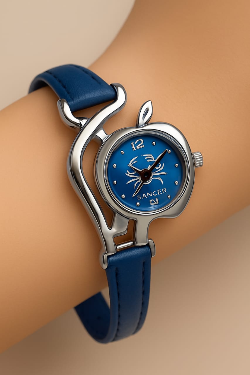 Wristwatch with blue strap and blue face on a wrist against a beige background