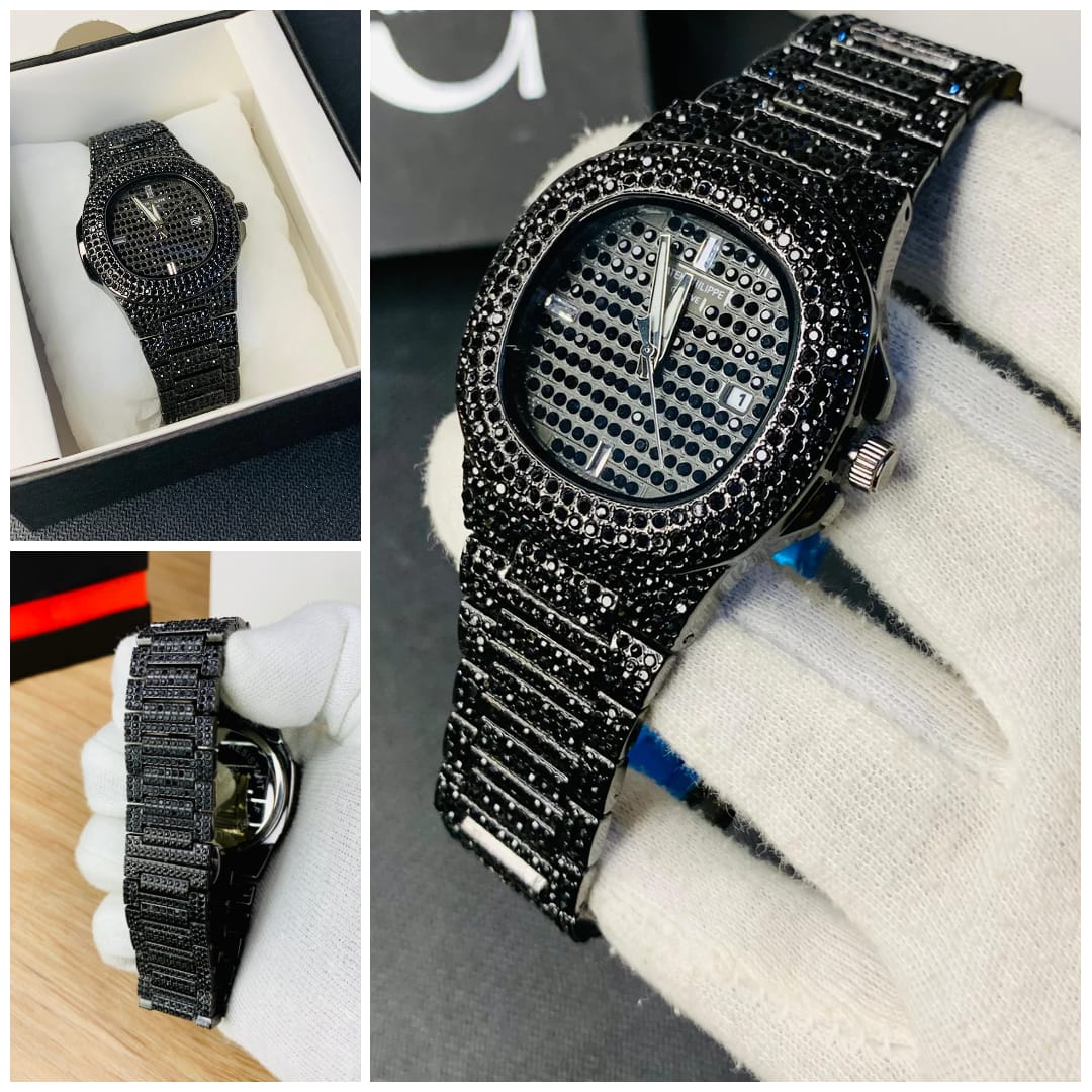 Black diamond-encrusted watch with close-up shots in a box and on a wrist.