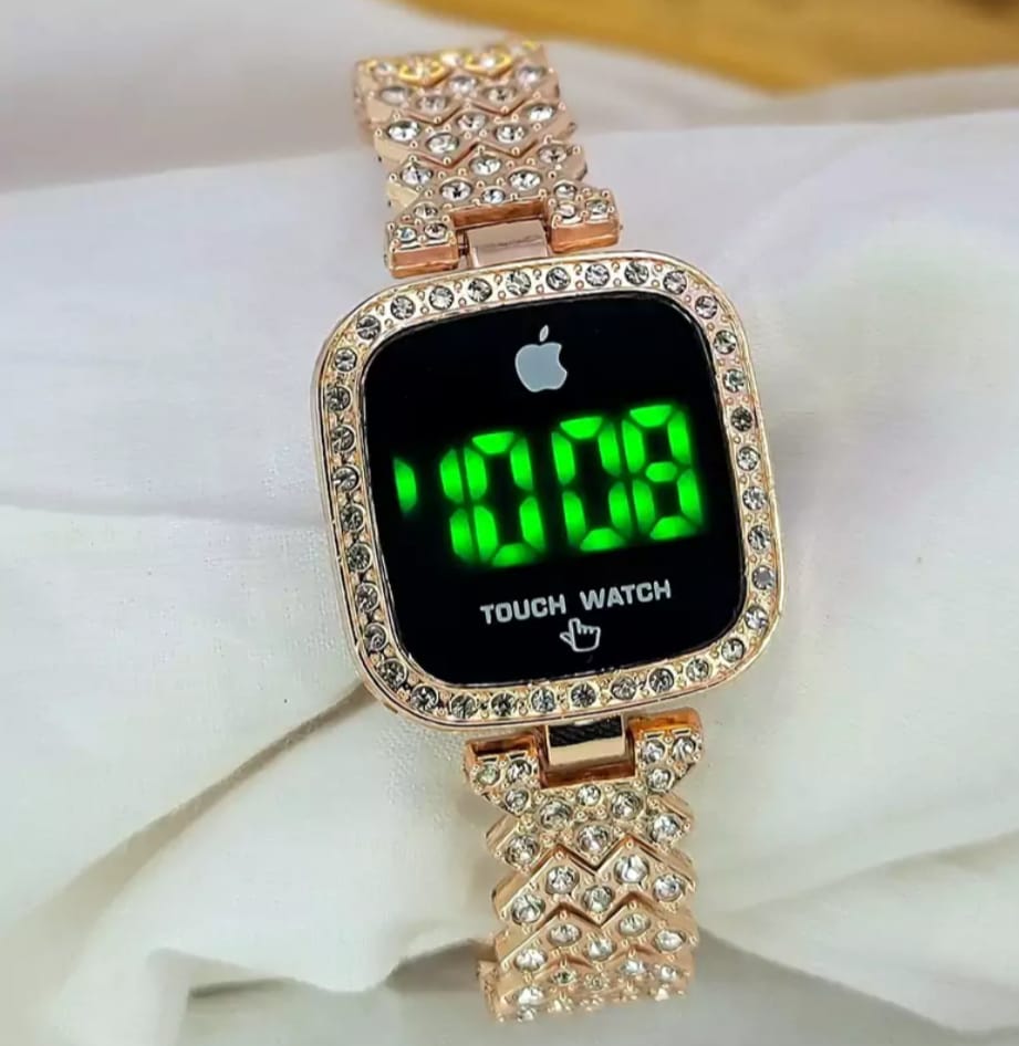 Digital watch with a rose gold strap and green display on a white background