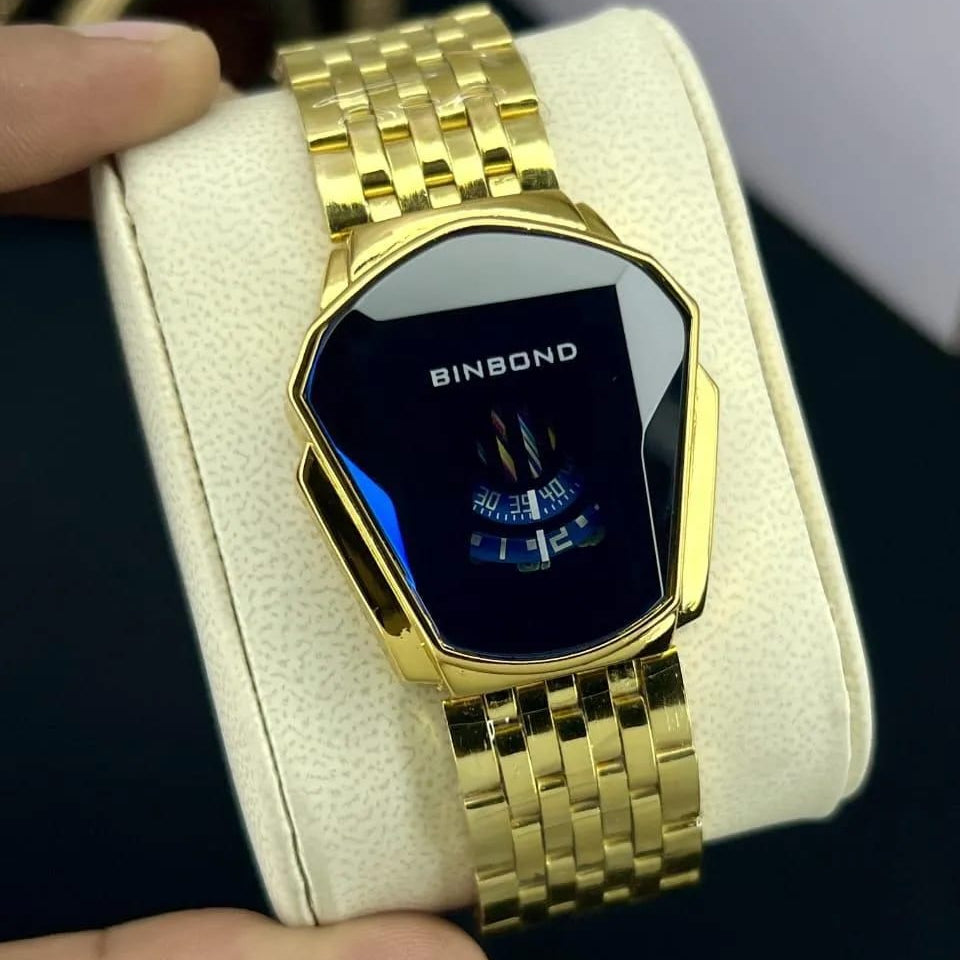 Gold wristwatch with a black display held in a white box