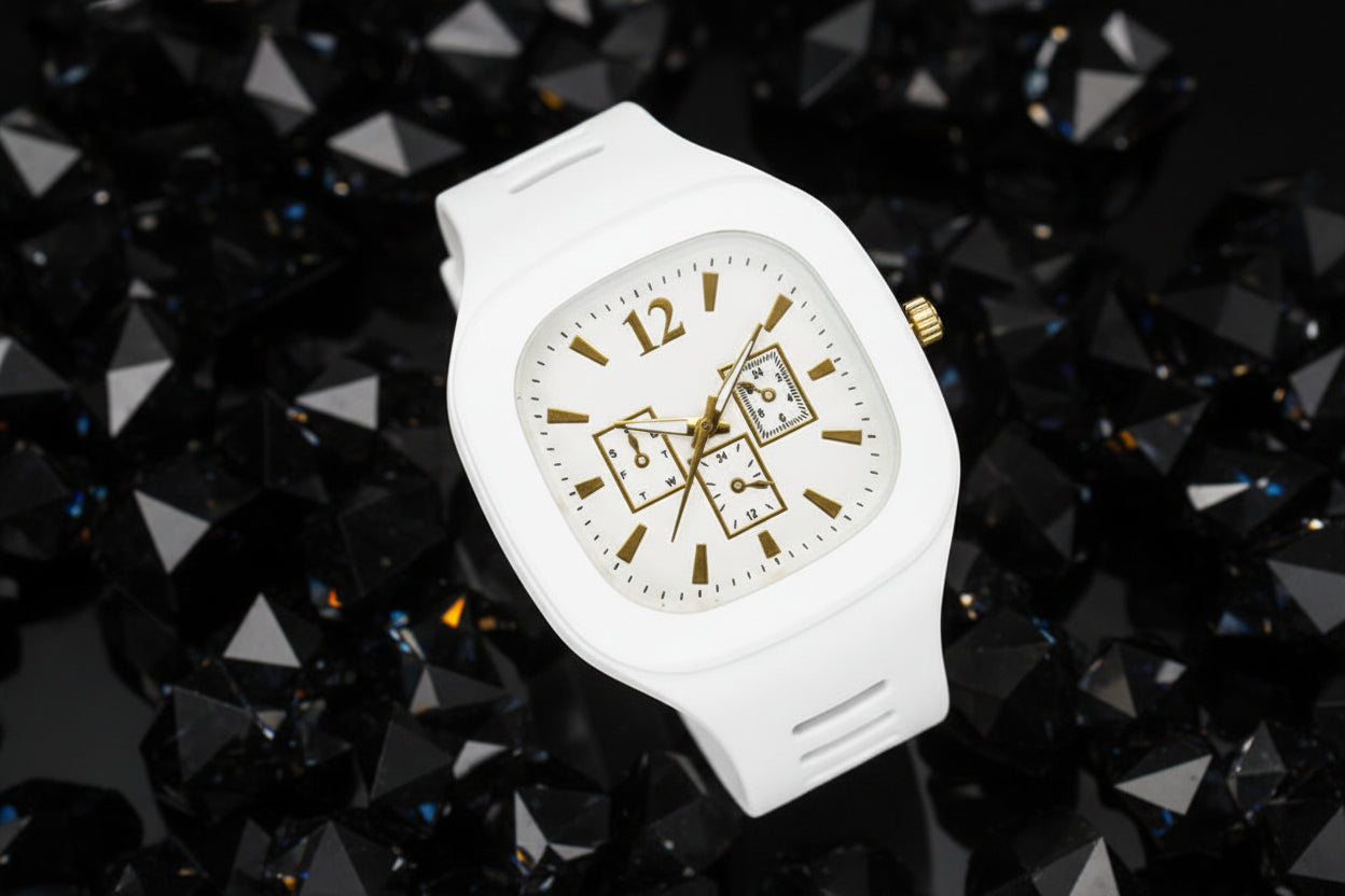 White watch with gold accents on a white background